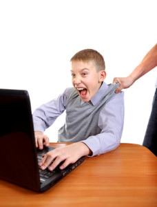 Parent dragging Son from Laptop Isolated on the White Background